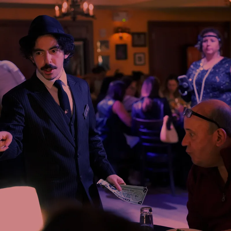 A detective questioning a guest at a Honolulu show