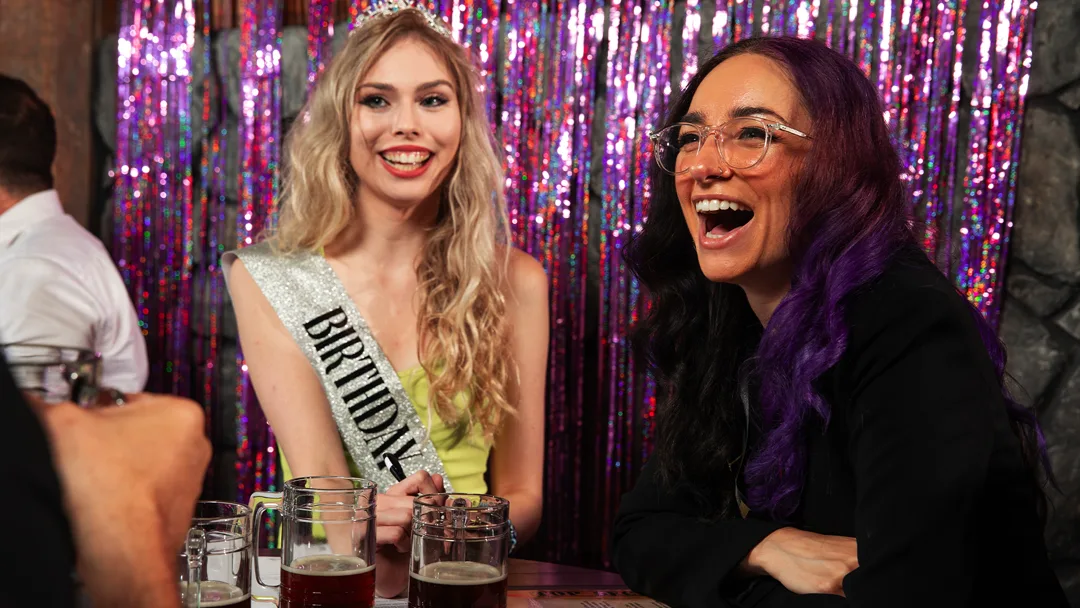 Guests celebrating at a Honolulu murder mystery party
