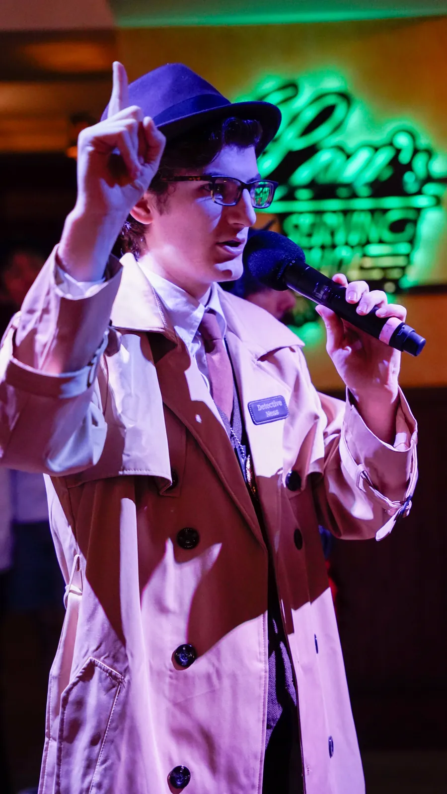 A Murder Mystery Company actor working the room at a Honolulu show