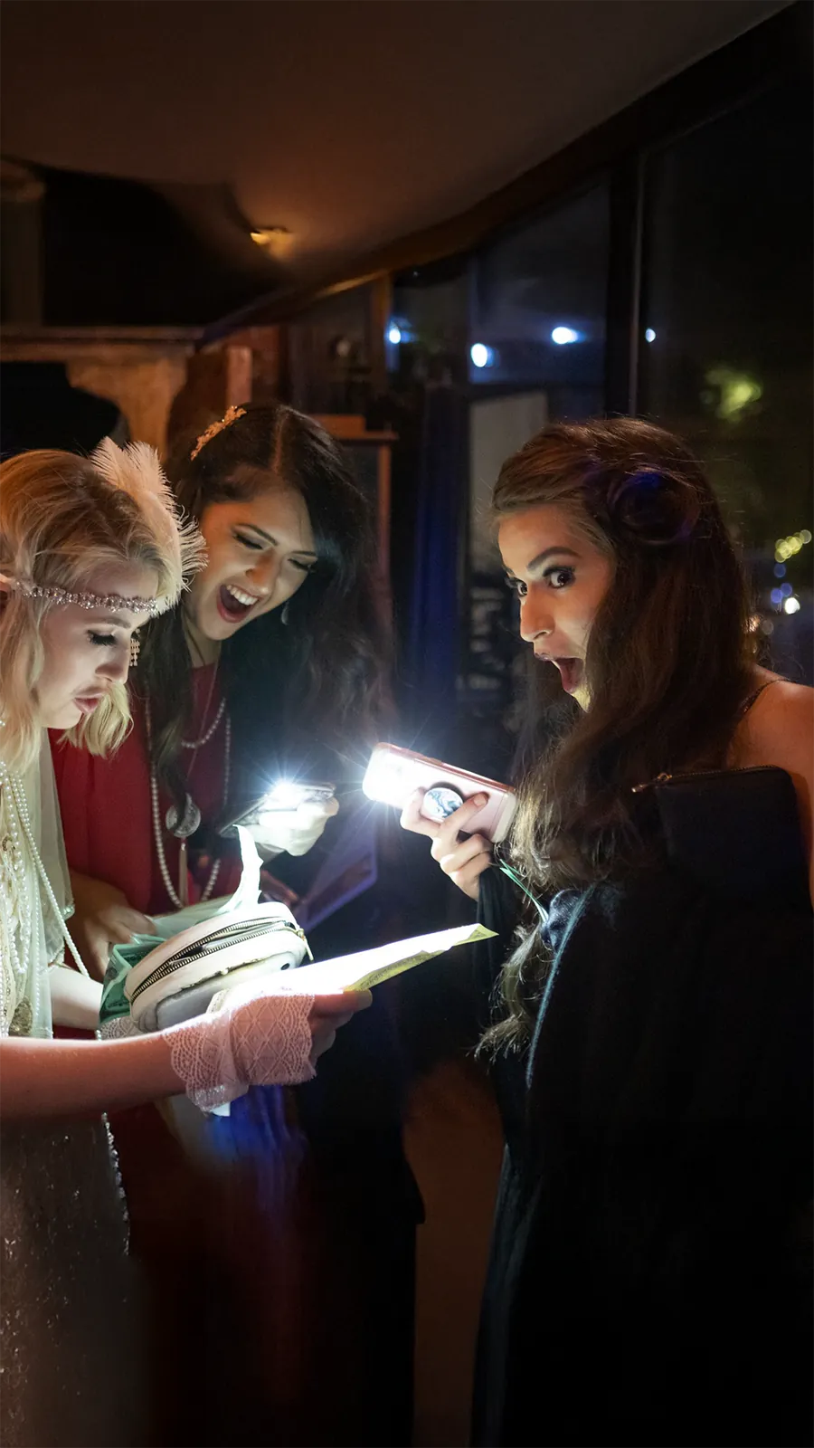 Guests at a Murder Mystery Company public dinner show in Honolulu